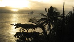 LOOKING OUT AT A FEW BOATS MOORED FOR THE NIGHT