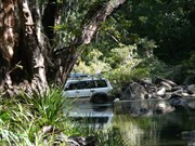 Looking downstream with car crossing