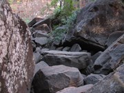 Track to falls over large boulders