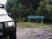 View of sign post on A10 marking Ring River Track