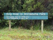 View of sign post on A10 marking Ring River Track