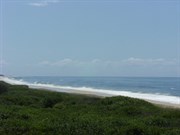 North Beach - Looking north from Surf Club towards Tuckers Rock and Bundagen 