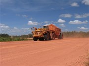 Giant trucks hauling the ore