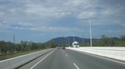 Bruce Highway Bridge over the Fitzroy River with Mt Archer in 