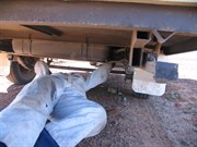 Gravel shrapnel destroys brake wiring conduit