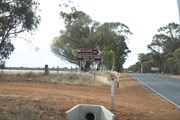 Signboard facing south on Great Southern Hwy showing start of 