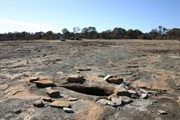 Numerous gnamma holes on Holland Rocks