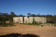 A ladder enables visitors to view water levels inside the tank