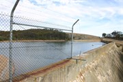 Dam atop wave rock
