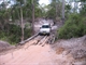 Heading north over the log bridge