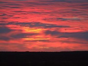 Sunset over the Hunt Oil Road