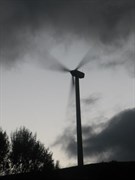 Toora wind farm - Silhouetted turbine at Toora wind farm