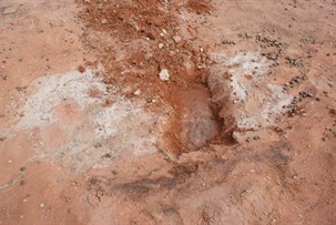 The rock sheet suppooerting the spring and soaks.