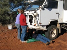 Repairing a broken bolt on the bull bar.