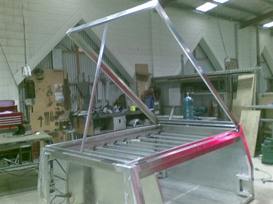 Lid up showing interior bed area