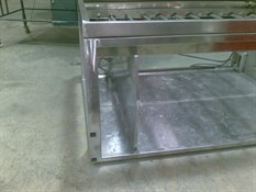 Rear internal storage area for tyres and tools.