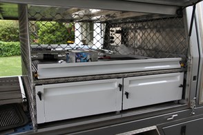 Drivers side drawers and top slide