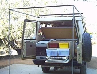 Tent frame slides into roof rack