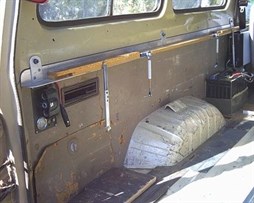 Bed base support fitted to seat anchorage points
