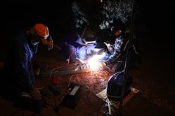 John welding the spring