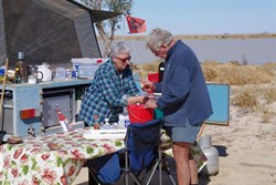 Ruth and Ian shelling their feast