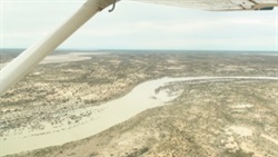 079 Cooper Crk in flood - a ferry and tinnies needed- why I couldn't get up to Birdsville and the Simpson