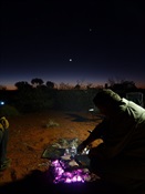 The camp cook hard at it.