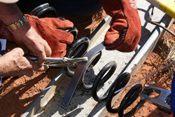 Bending the strap around the coil