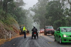 one lane of Princes Highway blocked while repairs are carried out after heavy rainfall