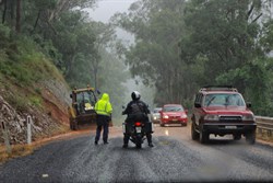 one lane closed on Highway to repair damage to road after heavy rain