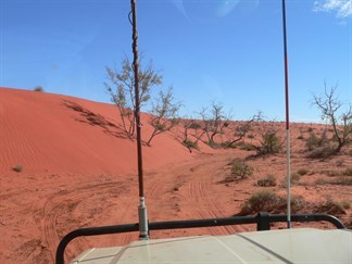 Loose sand encroaching on the track