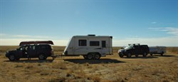 our two rigs parked beside the track north of Marree