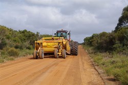 Large farm machinery on East West Highway