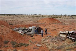 The boys explorong the dump
