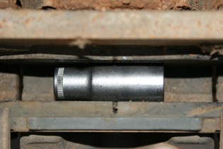 12mm socket wedged between brake pads - An old trick for a new player