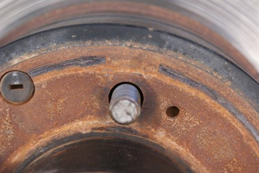 Original stud - NOTE excessive gap around the stud
