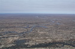 From here the Cooper snakes its way to Lake Eyre in the distance