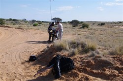 Helping Hideya getting his bike back up