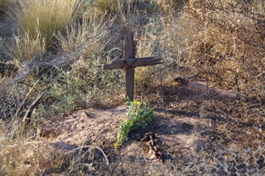 It was a very sad time when Fiona placed the flowers on the grave