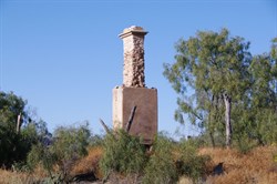 The old chimney is the tallest structure at Annandale