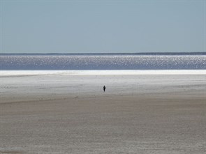 Val walked out towards the water