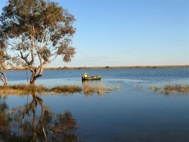John boating on Cooper Creek