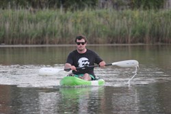 Brandon having a go in the kayak