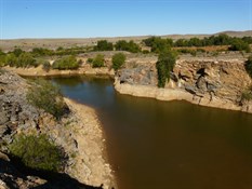 The old mine now filled with water