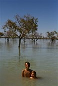 Kid having fun...what no bathers?