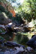 Crystal clear water, red cliffs