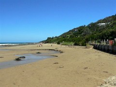 Beach at Wye River with the town clinging to the hillside above