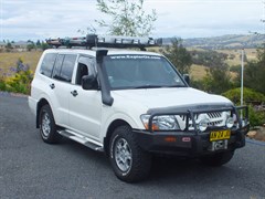 Pajero with modifications, rack, lights etc
